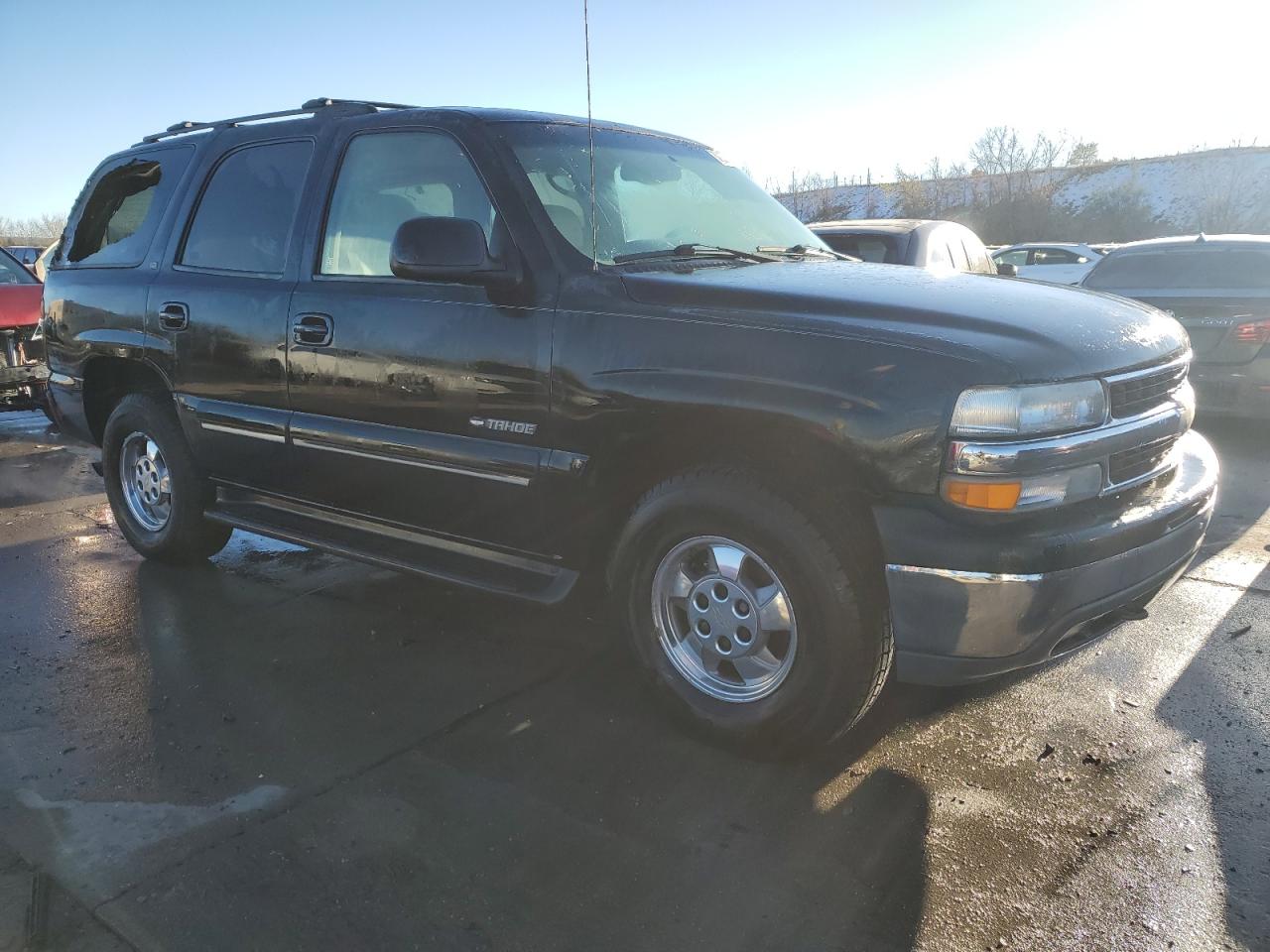 2001 Chevrolet Tahoe VIN 1GNEK13TX1J156271 Copart auction photo, burn damage thumbnail 4