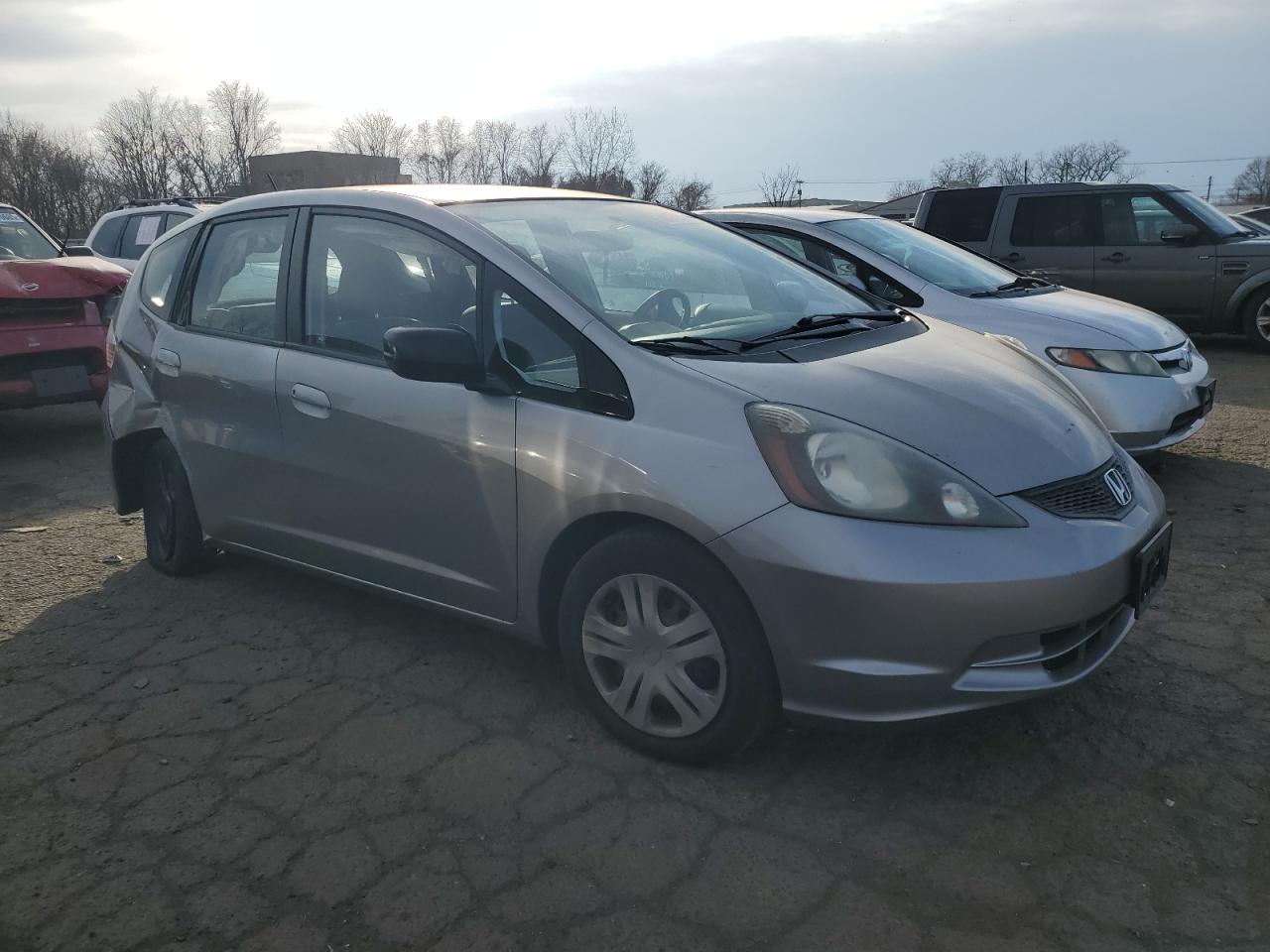 2010 Honda Fit VIN JHMGE8H29AS026704 Copart auction photo, side damage thumbnail 4
