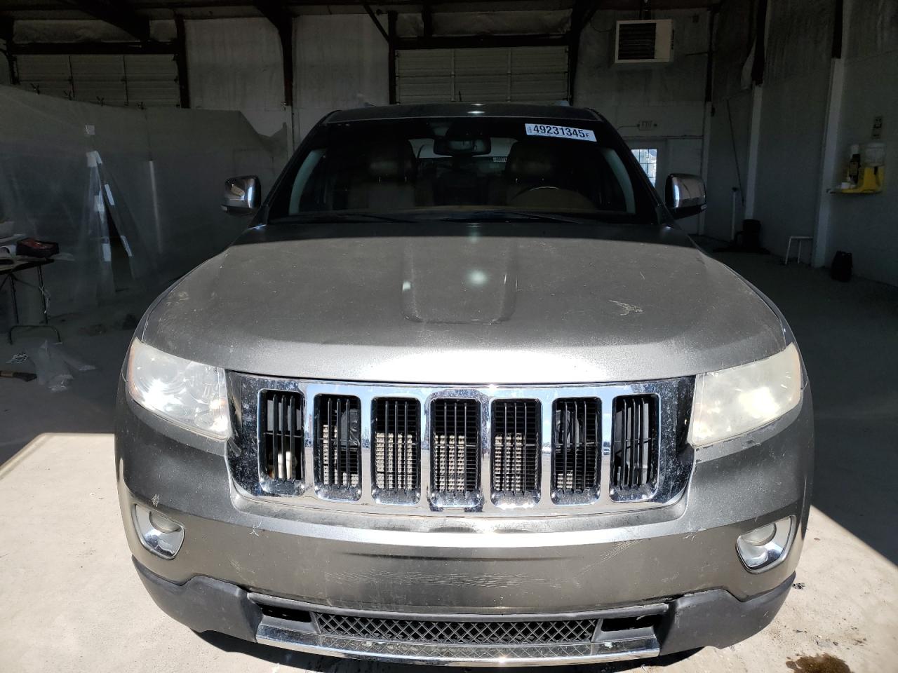 2012 Jeep Grand Cherokee VIN 1C4RJFCTXCC132330 Copart auction photo, rear end / side damage thumbnail 5