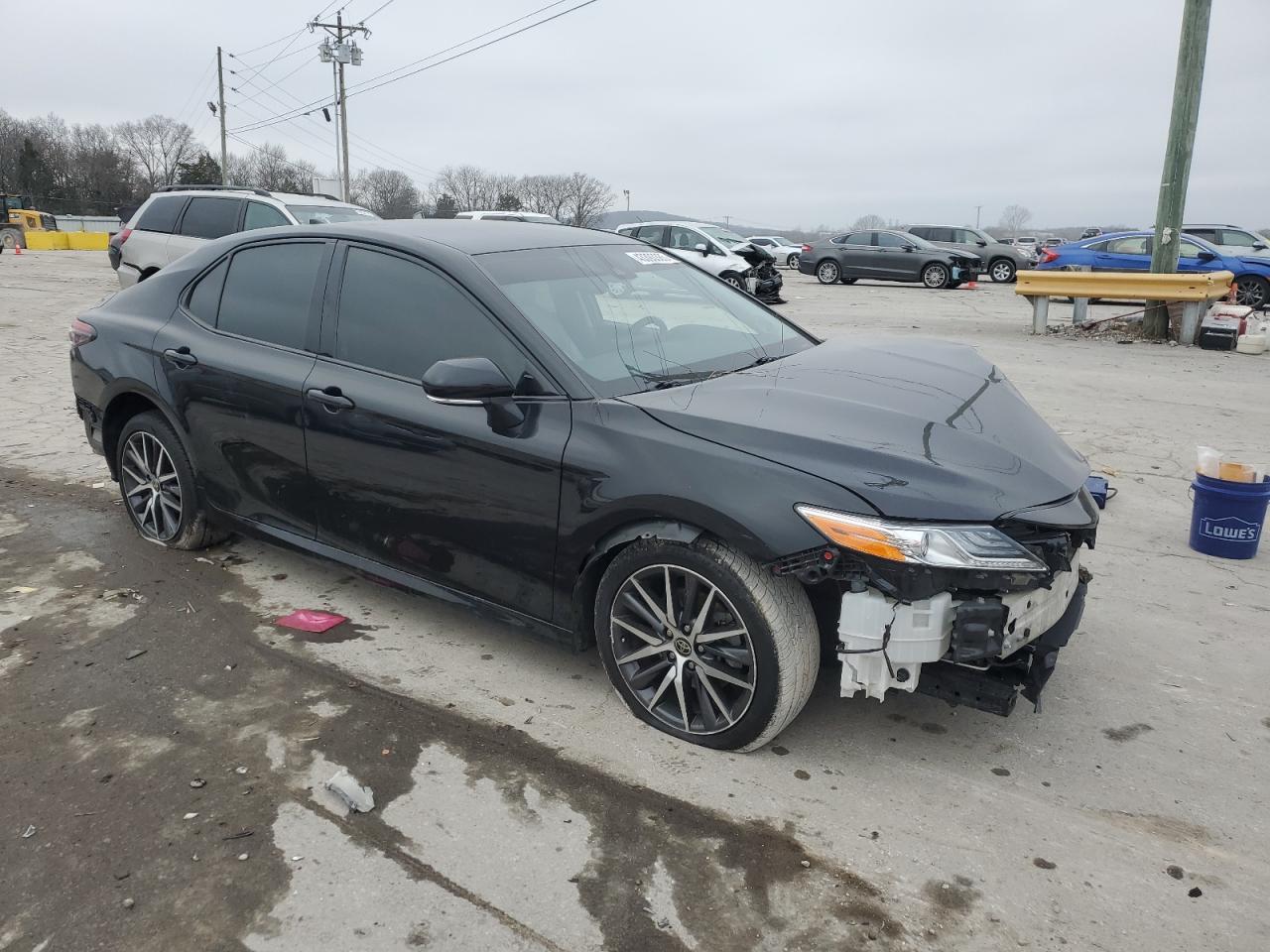 2022 Toyota Camry VIN 4T1F11BK1NU057749 Copart auction photo, undercarriage / all over damage thumbnail 4