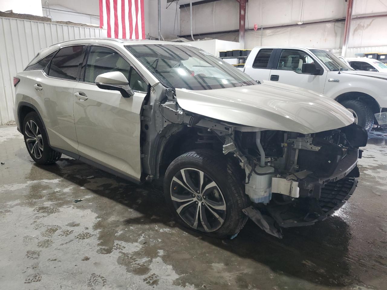 2021 Lexus RX VIN 2T2HZMAA0MC214002 Copart auction photo, side / undercarriage damage thumbnail 4