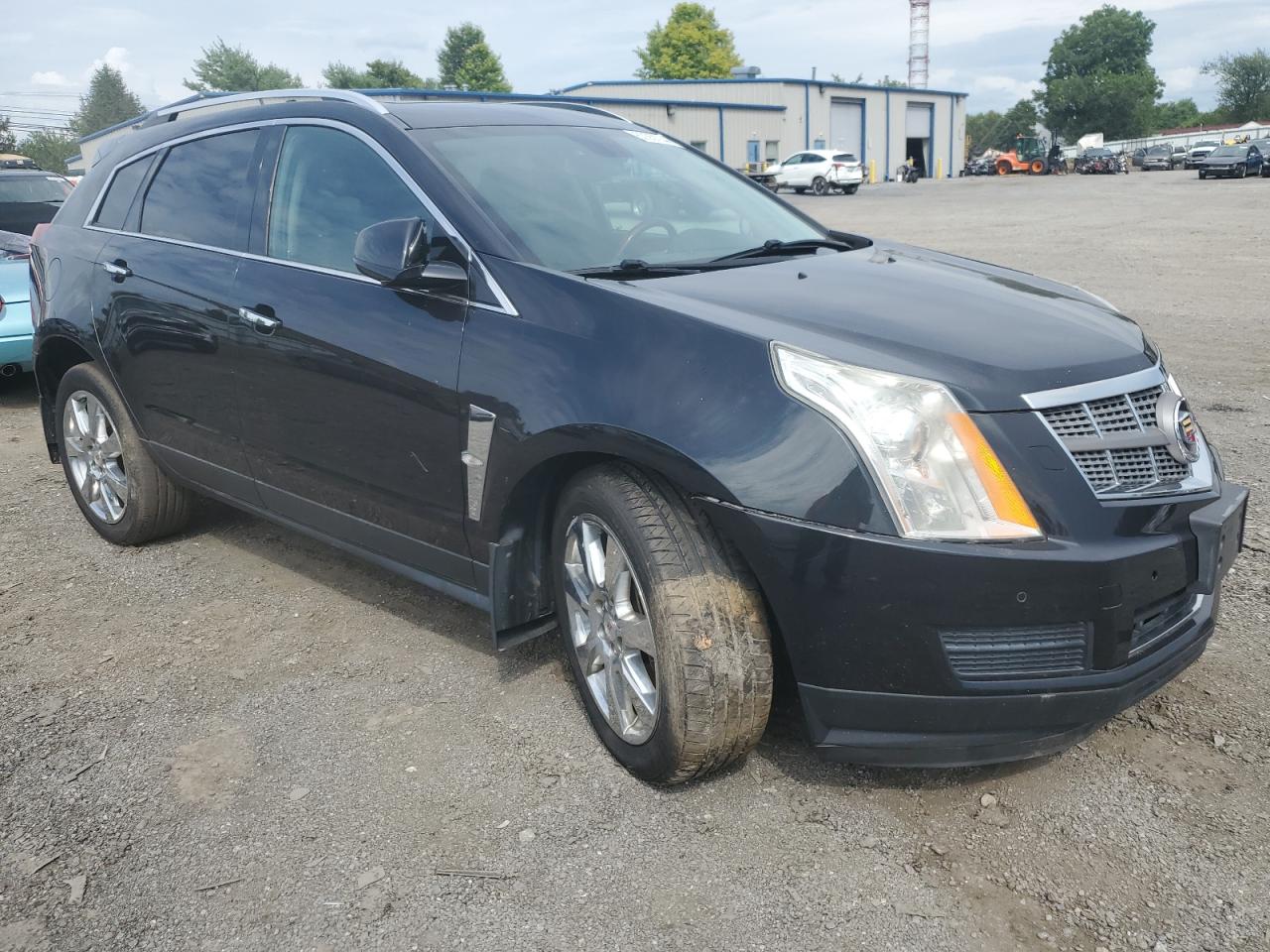 2011 Cadillac SRX VIN 3GYFNEEY3BS525342 Copart auction photo, undercarriage / all over damage thumbnail 4