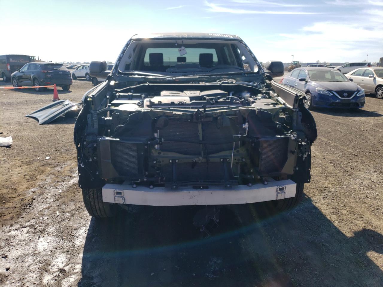 2023 Toyota Tundra VIN 5TFLA5DB7PX128983 Copart auction photo, all over damage thumbnail 5