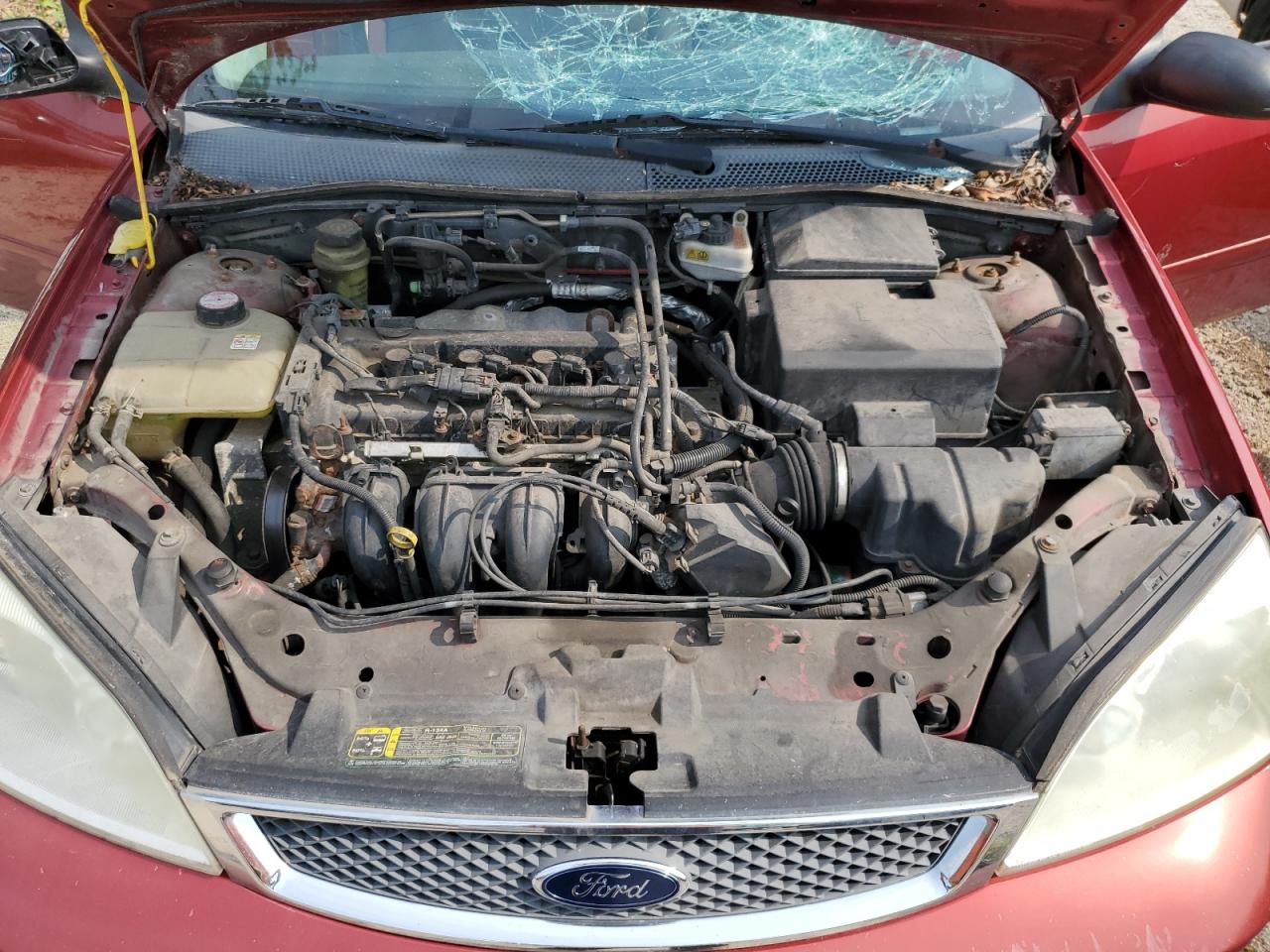 2005 Ford Focus VIN 3FAFP37N55R125470 Copart auction photo, all over damage thumbnail 12