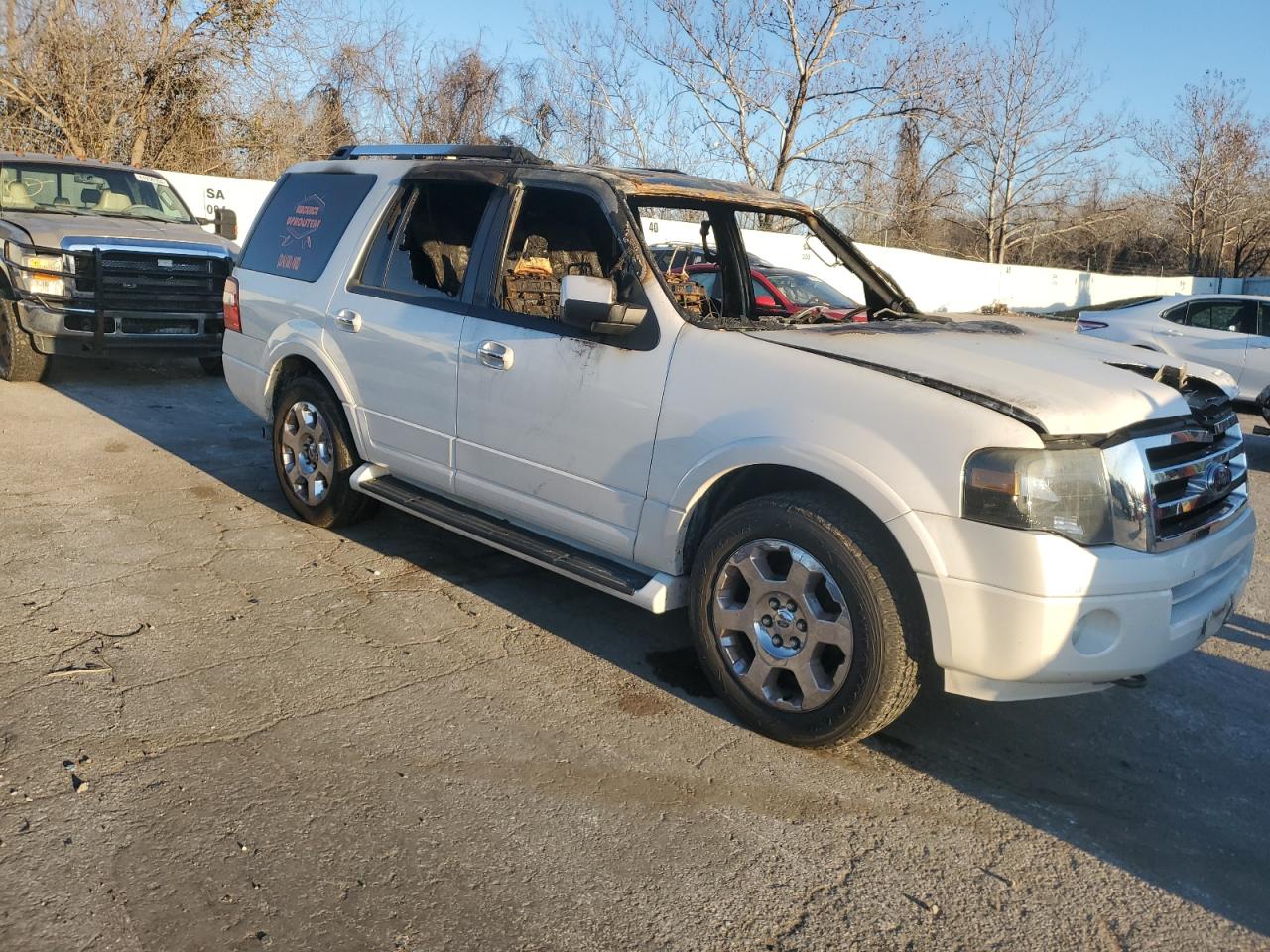 2013 Ford Expedition VIN 1FMJU2A58DEF30784 Copart auction photo, burn damage thumbnail 4