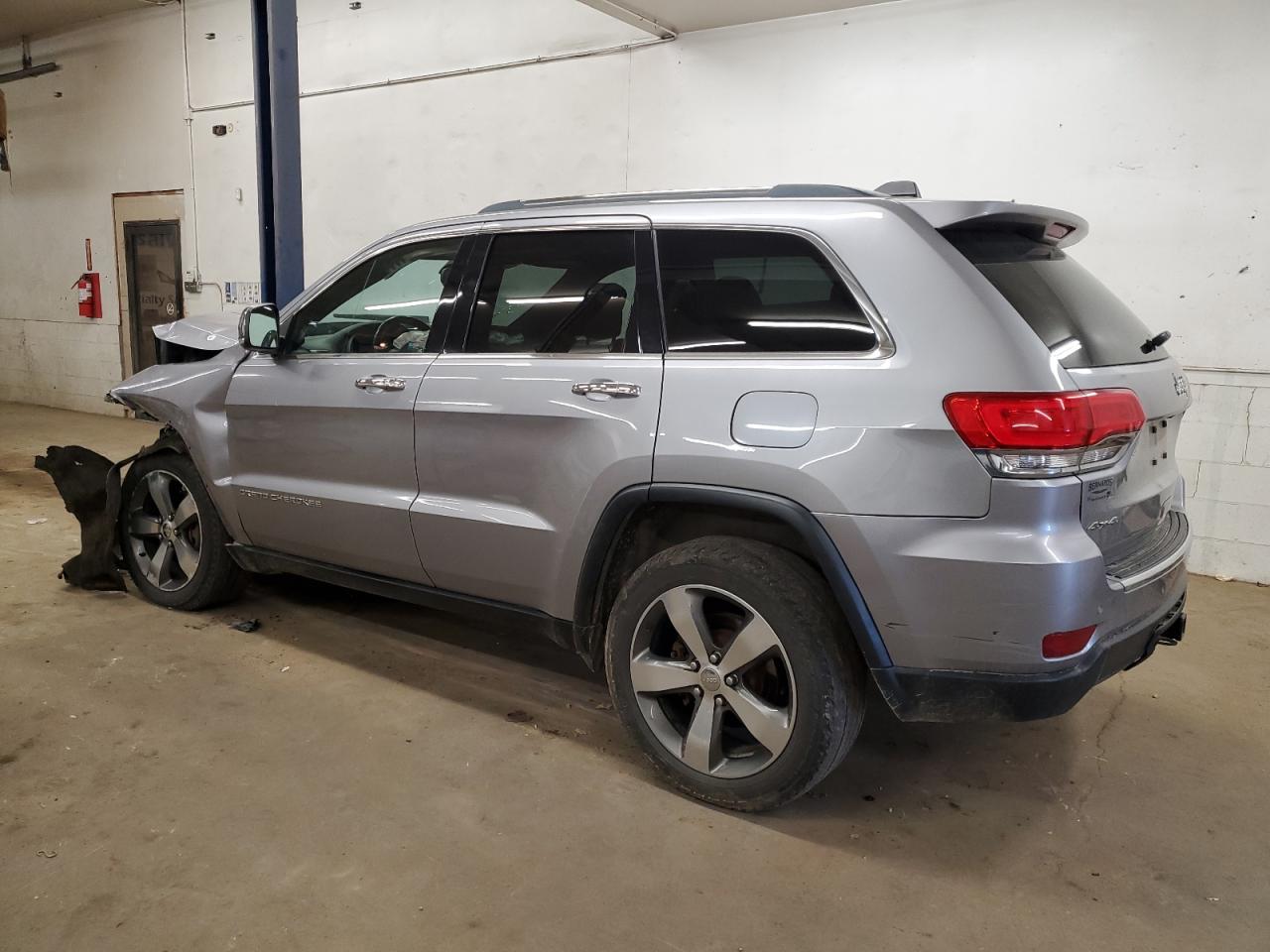2015 Jeep Grand Cherokee VIN 1C4RJFBG2FC716469 Copart auction photo, front end / rear end damage thumbnail 2