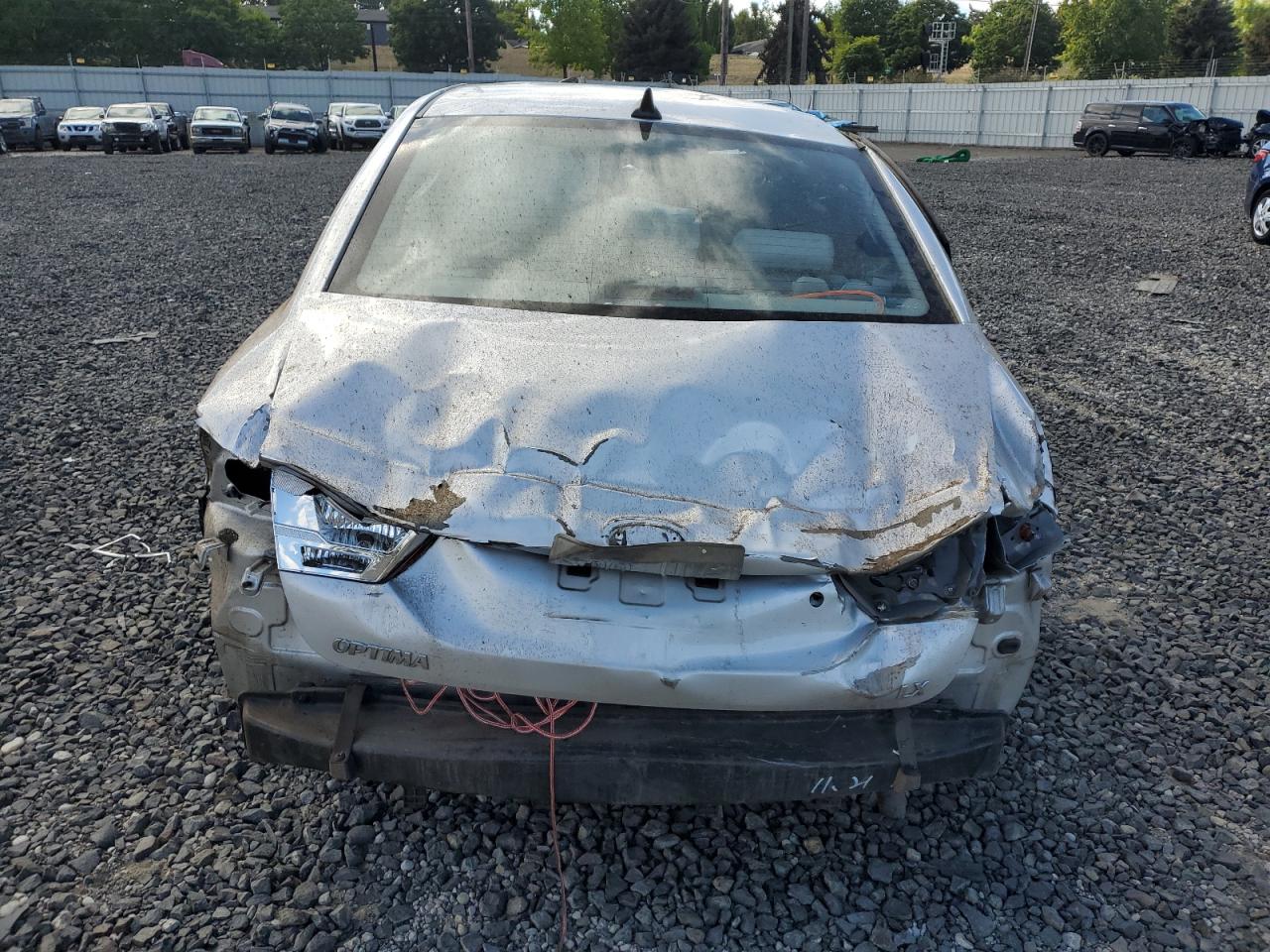 2009 KIA Optima VIN KNAGE228995320140 Copart auction photo, all over damage thumbnail 6
