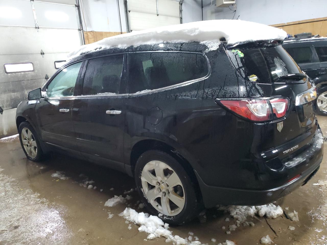 2016 Chevrolet Traverse VIN 1GNKVGKDXGJ166282 Copart auction photo, front end / minor dent/scratches damage thumbnail 2
