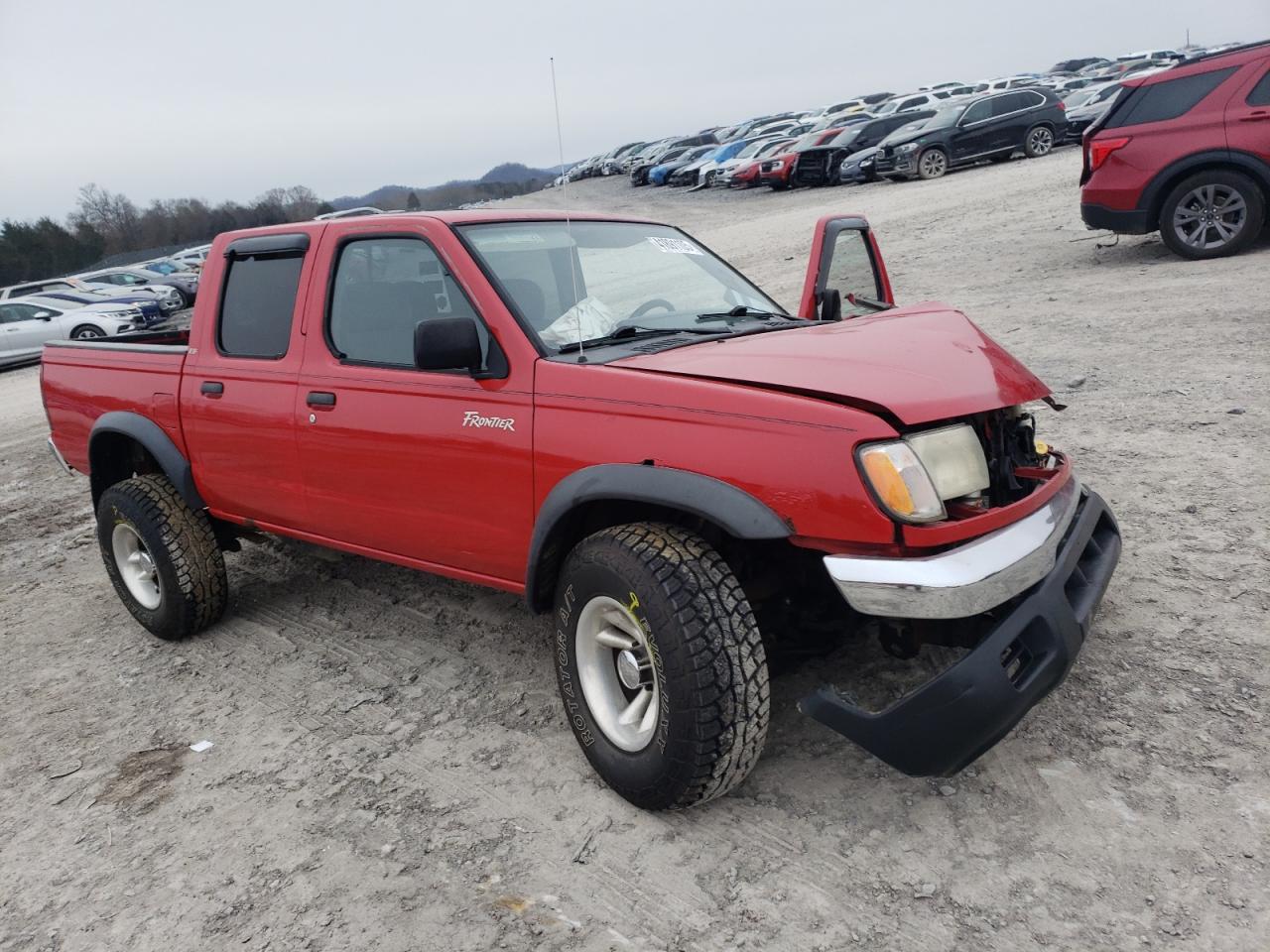 2000 Nissan Navara (Frontier) VIN 1N6ED27Y8YC324175 Copart auction photo, front end / undercarriage damage thumbnail 4