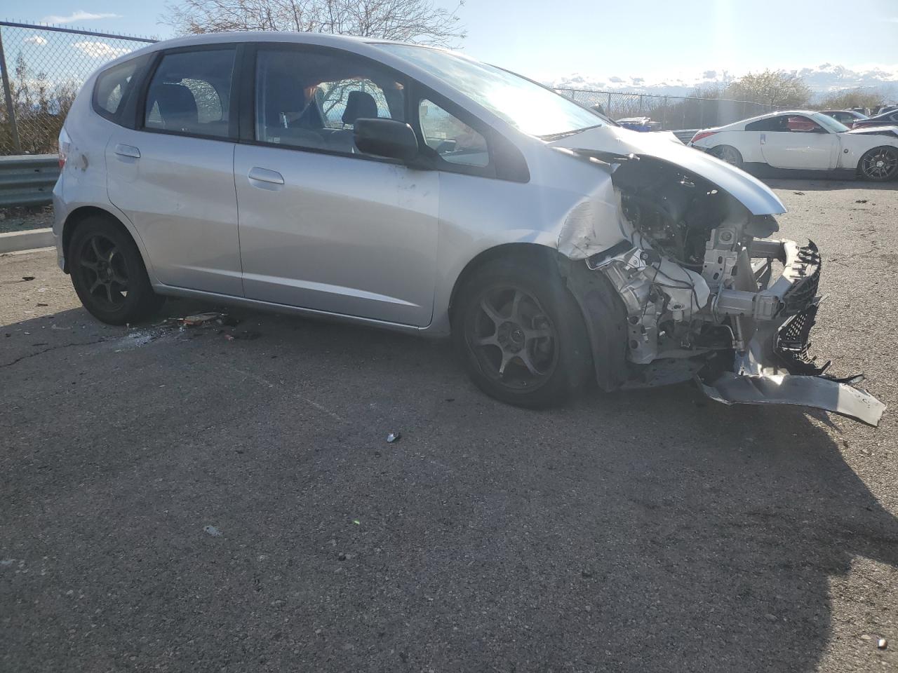 2011 Honda Fit VIN JHMGE8H35BS011501 Copart auction photo, front end damage thumbnail 4
