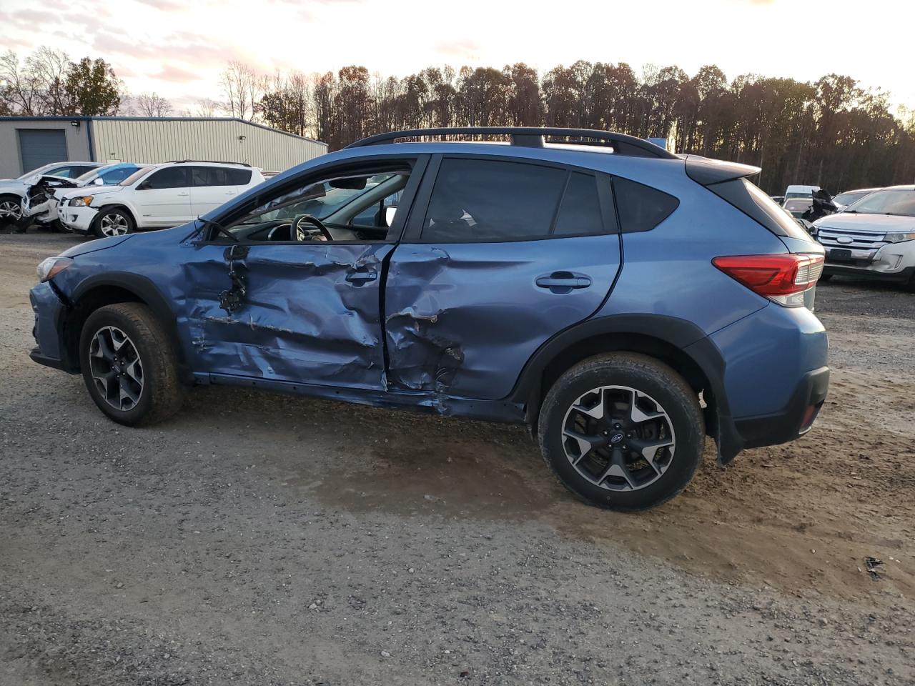2020 Subaru XV VIN JF2GTAPC3L8239951 Copart auction photo, side / front end damage thumbnail 2