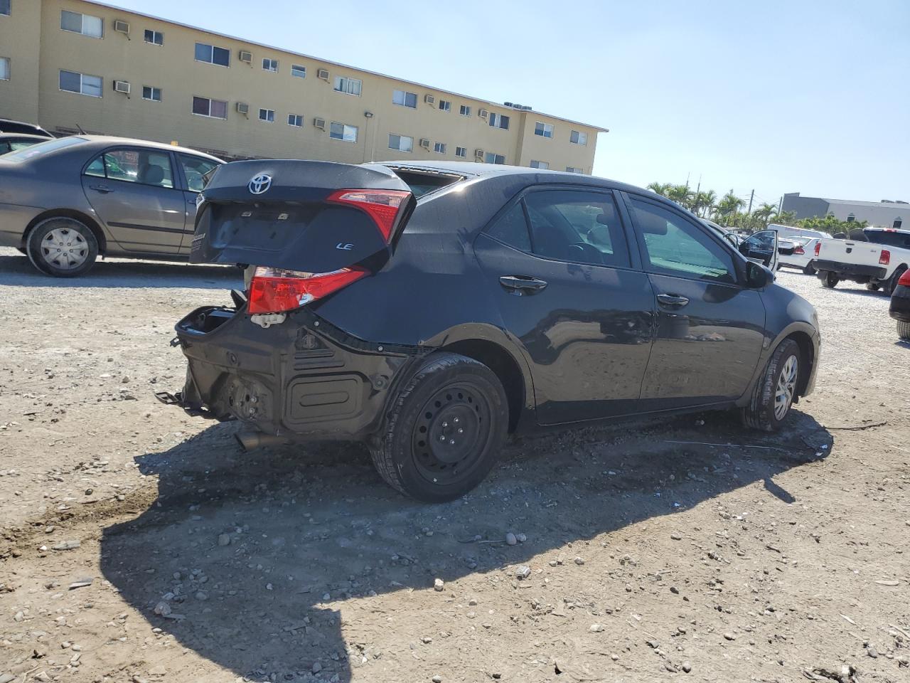 2019 Toyota Corolla VIN 5YFBURHE5KP865864 Copart auction photo, rear end / minor dent/scratches damage thumbnail 3