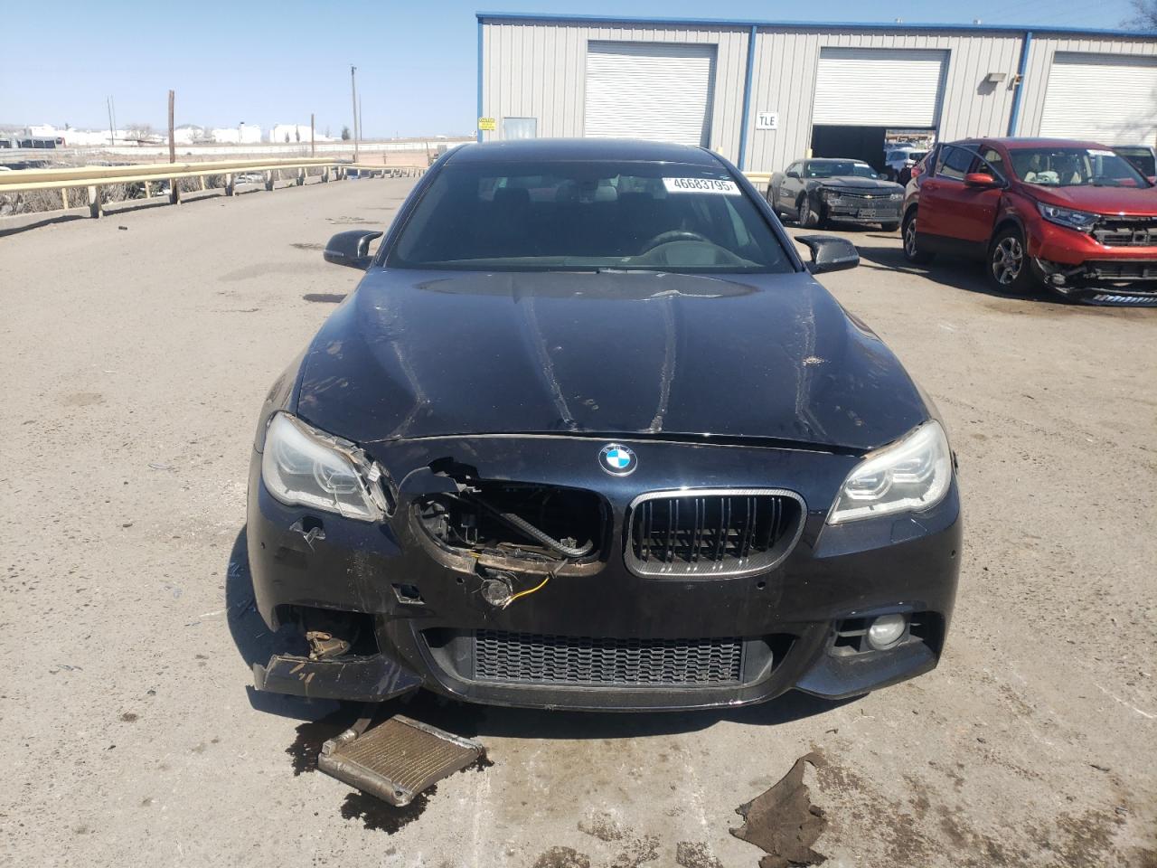 2015 BMW 5er VIN WBAKN9C50FD961489 Copart auction photo, undercarriage / front end damage thumbnail 5