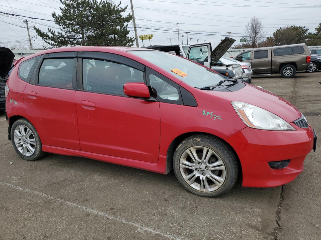2009 Honda Fit VIN JHMGE884X9S028295 Copart auction photo, rear end damage thumbnail 4