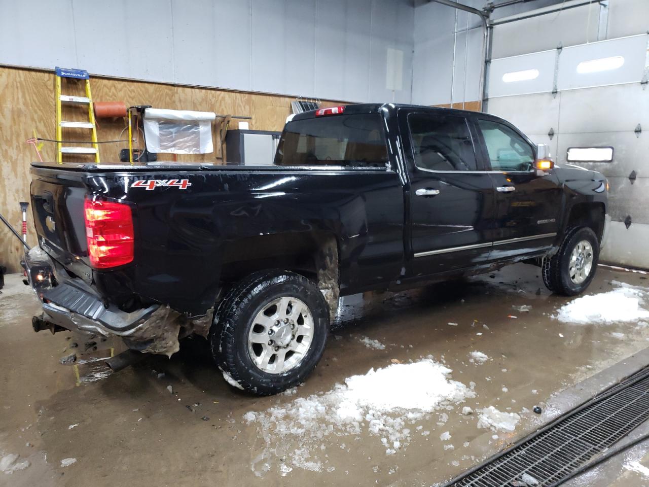 2015 Chevrolet Silverado VIN 1GC1KWEG5FF613860 Copart auction photo, side / front end damage thumbnail 3