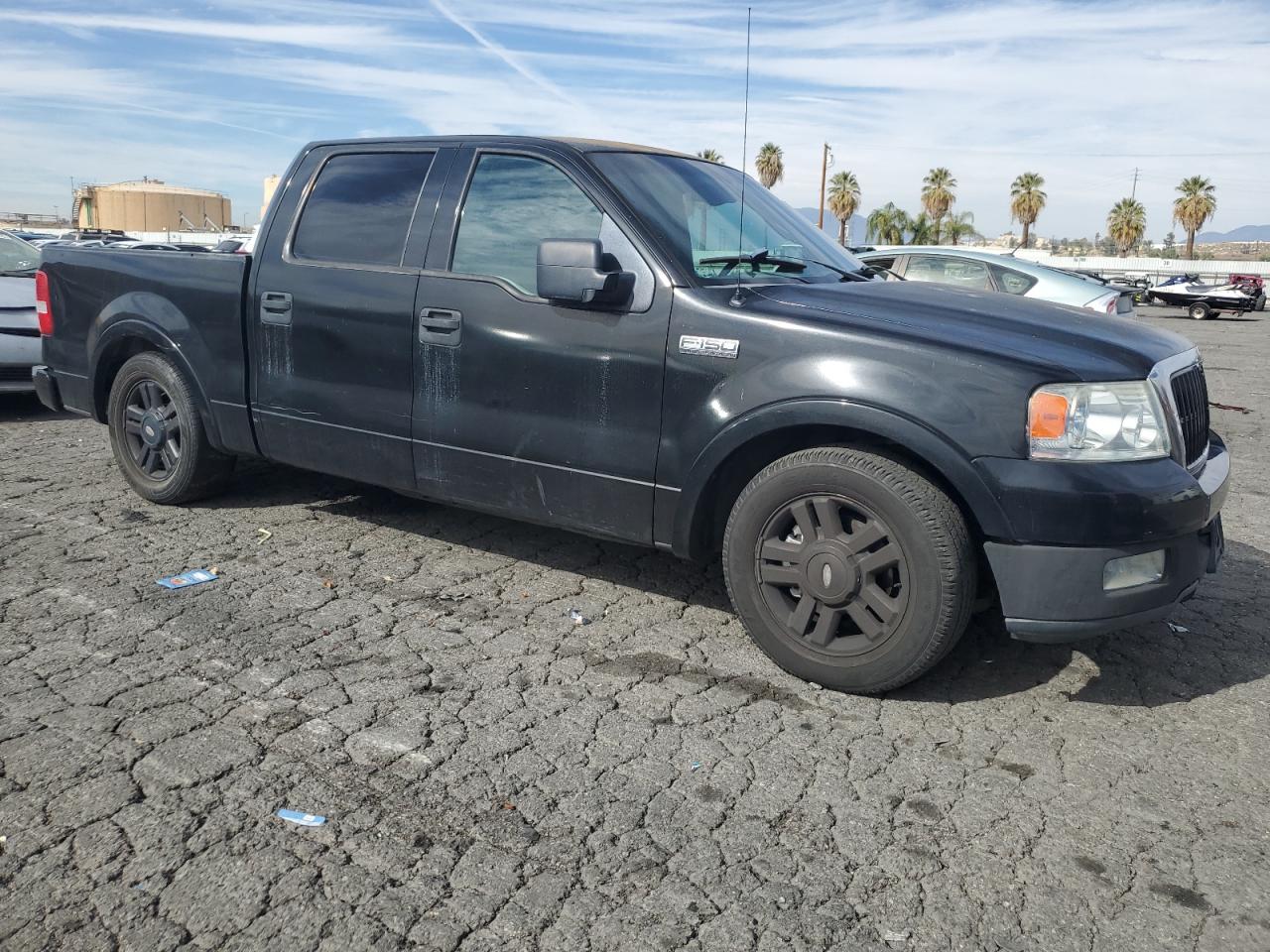 2004 Ford F-150 VIN 1FTPW12574KB78901 Copart auction photo, rear end damage thumbnail 4