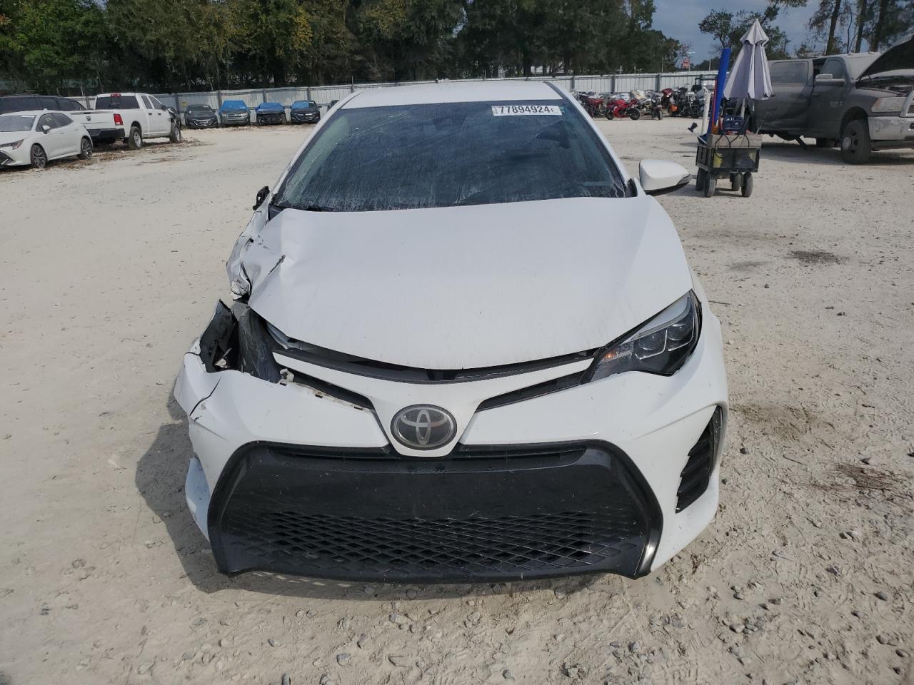 2018 Toyota Corolla VIN 5YFBURHE8JP774716 Copart auction photo, front end / side damage thumbnail 5