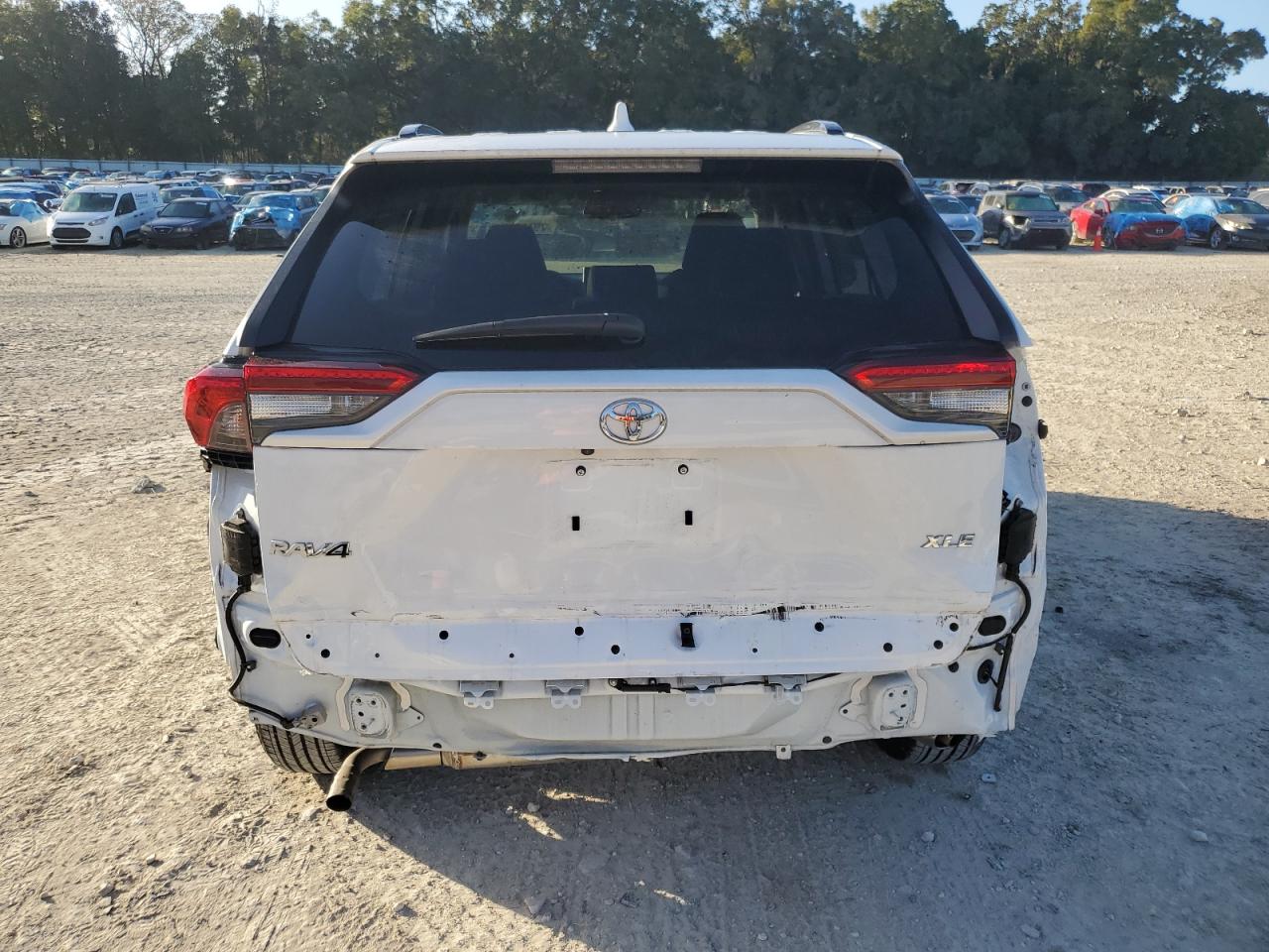 2023 Toyota RAV 4 VIN 2T3W1RFV1PW241795 Copart auction photo, front end / rear end damage thumbnail 6