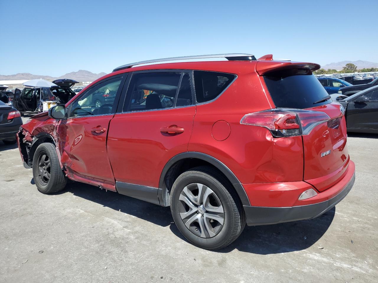 2016 Toyota RAV 4 VIN JTMZFREV5GJ092239 Copart auction photo, all over damage thumbnail 2