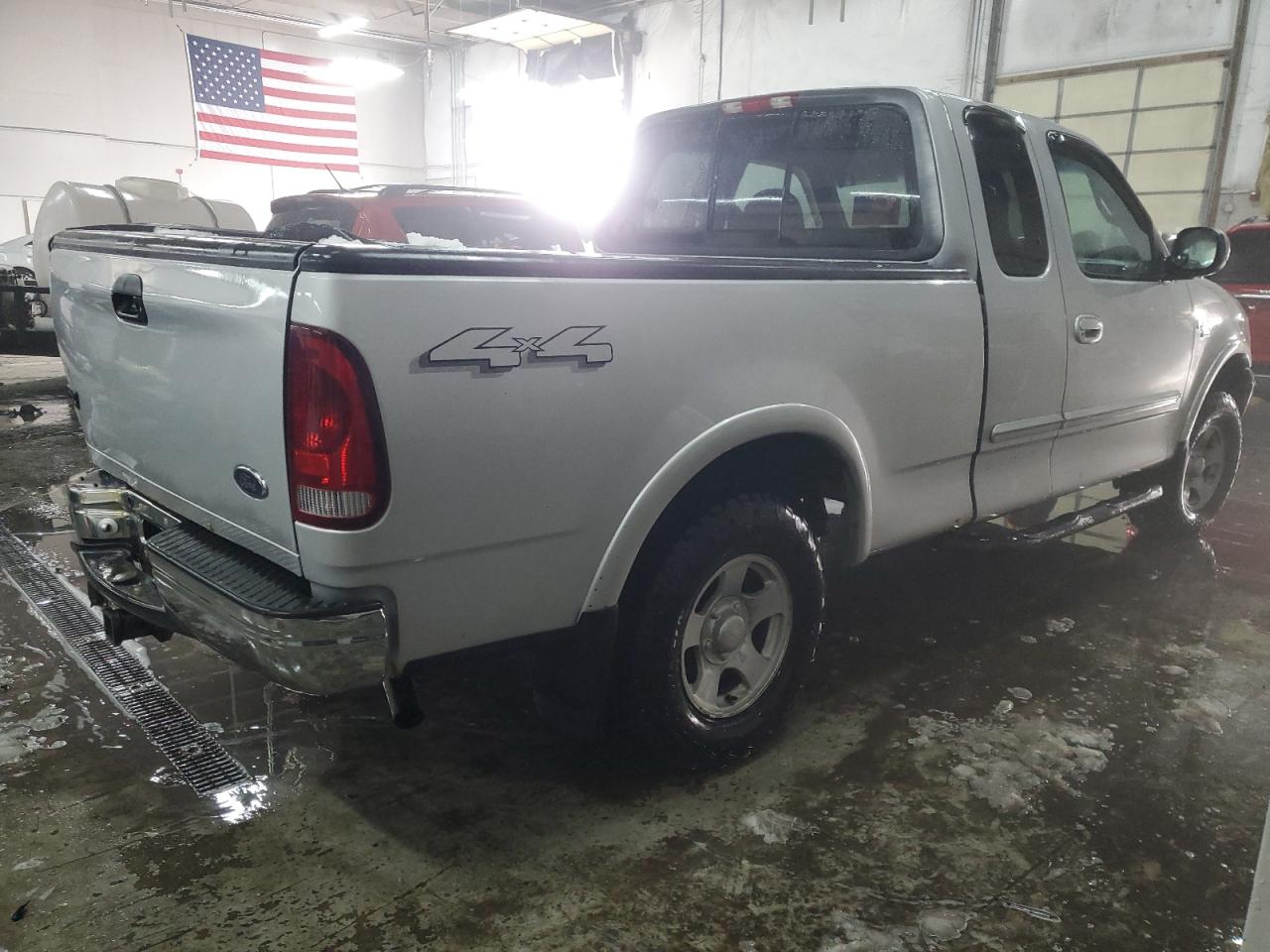 2000 Ford F-150 VIN 1FTRX18L5YNA41830 Copart auction photo, rear end damage thumbnail 3