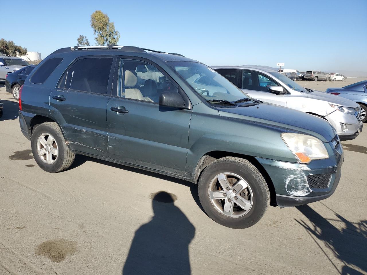 2009 KIA Sportage VIN KNDJE723897611677 Copart auction photo, all over damage thumbnail 4