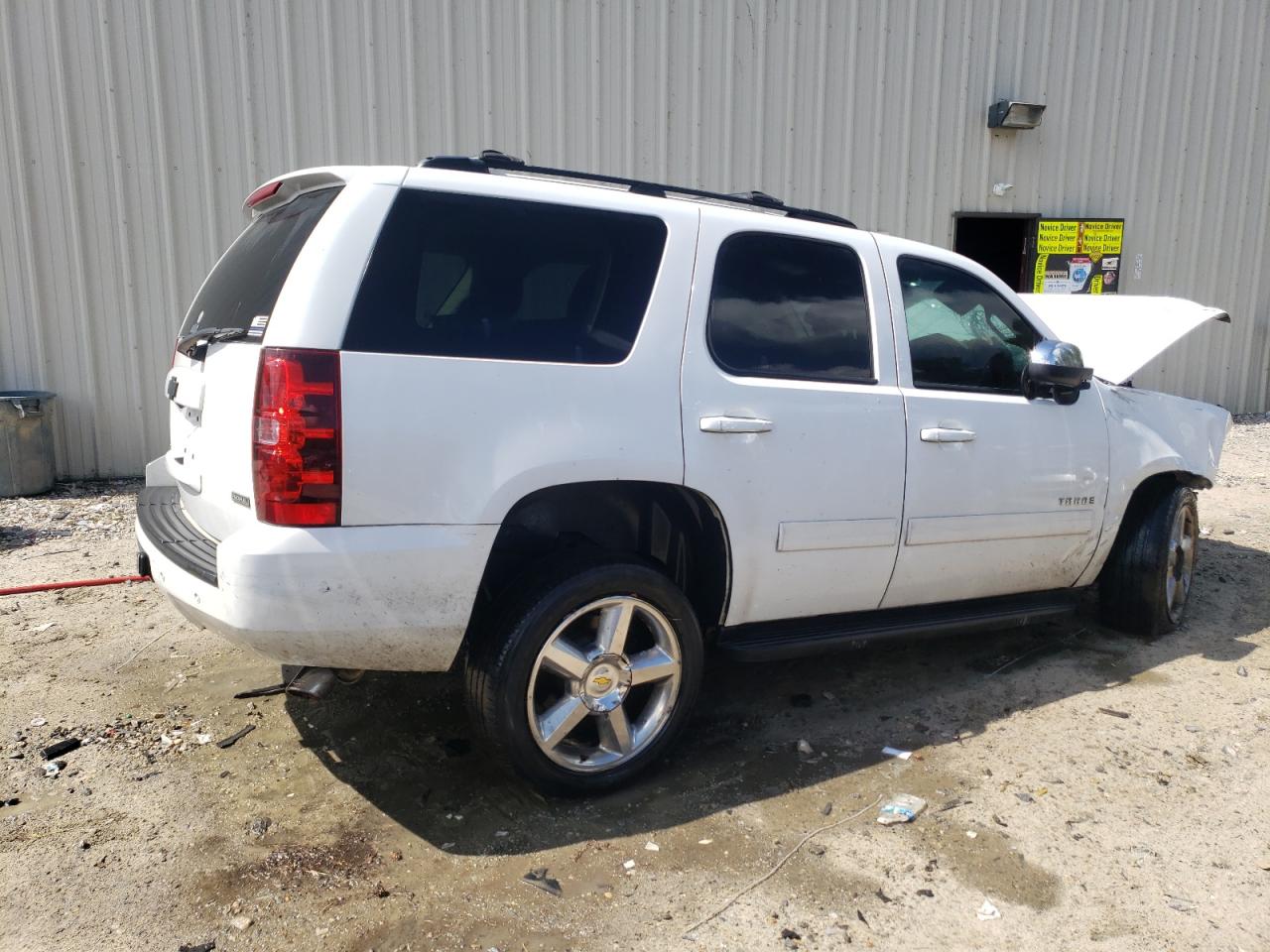 2011 Chevrolet Tahoe VIN 1GNSKAE08BR380793 Copart auction photo, front end / side damage thumbnail 3
