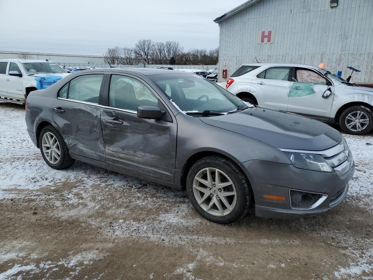 2012 Ford Fusion VIN 3FAHP0JA6CR412262 Copart auction photo, side / front end damage thumbnail 4
