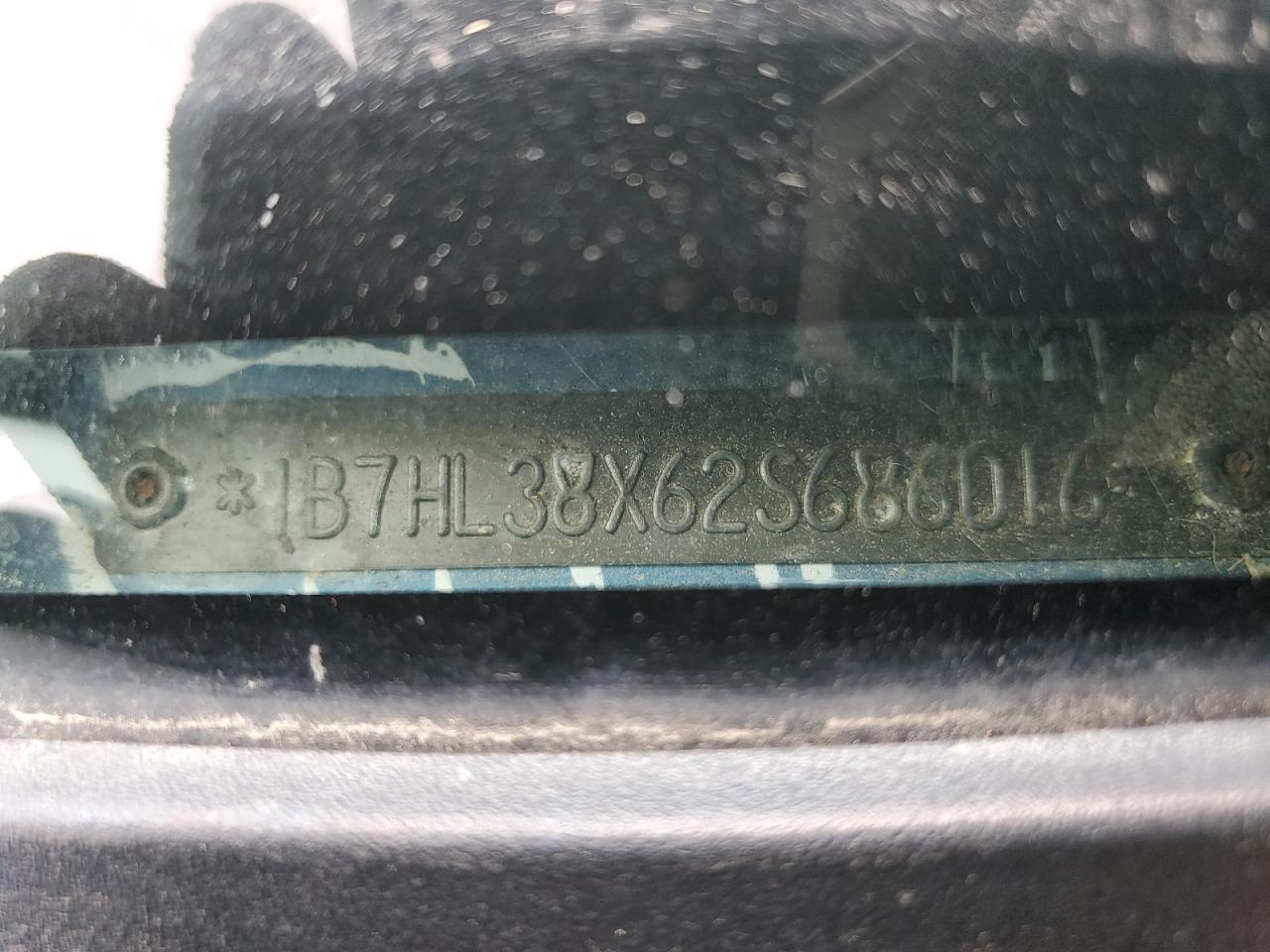 2002 Dodge Dakota VIN 1B7HL38X62S686016 Copart auction photo, front end / undercarriage damage thumbnail 13