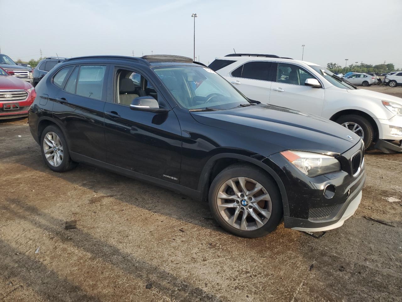 2015 BMW X1 VIN WBAVL1C52FVY28134 Copart auction photo, water/flood damage thumbnail 4