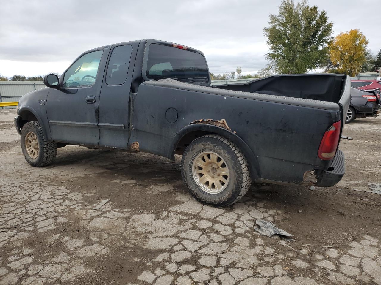 2001 Ford F-150 VIN 1FTRX18W21KA55346 Copart auction photo, rear end / side damage thumbnail 2