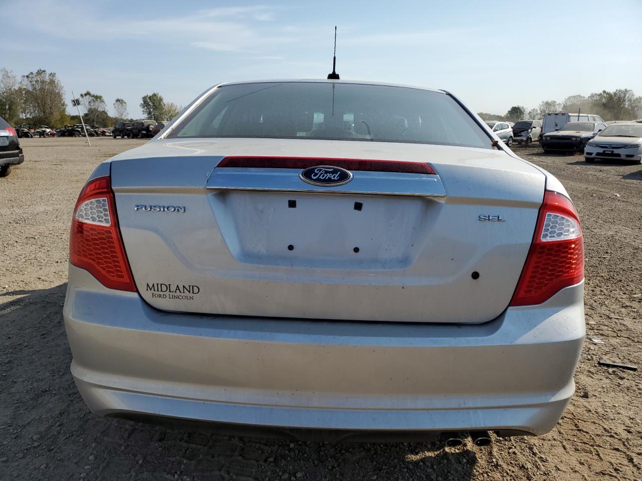 2010 Ford Fusion VIN 3FAHP0JA9AR342561 Copart auction photo, side / front end damage thumbnail 6