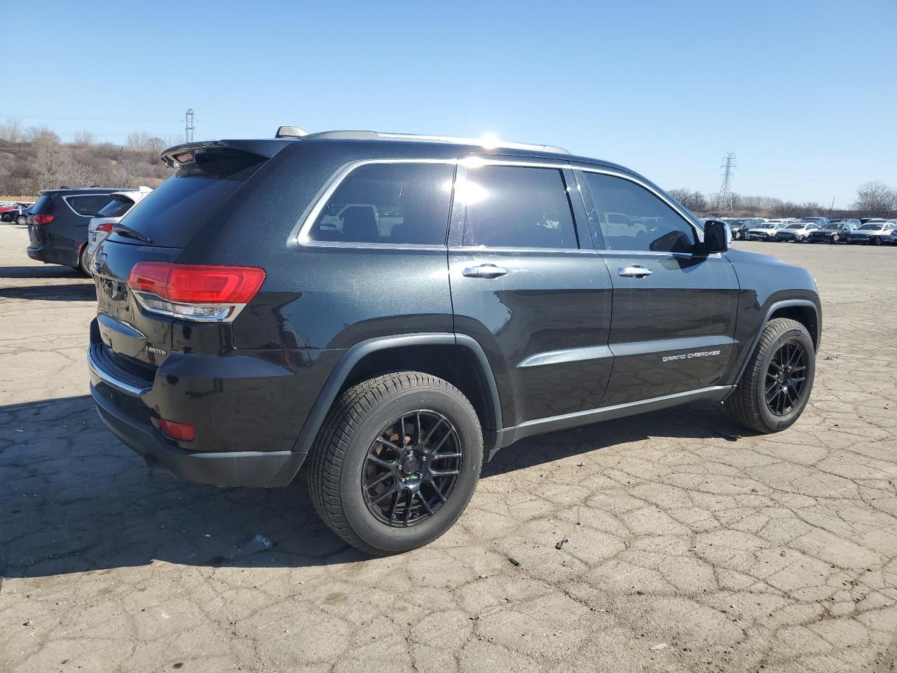 2014 Jeep Grand Cherokee VIN 1C4RJFBT3EC129113 Copart auction photo, minor dent/scratches damage thumbnail 3