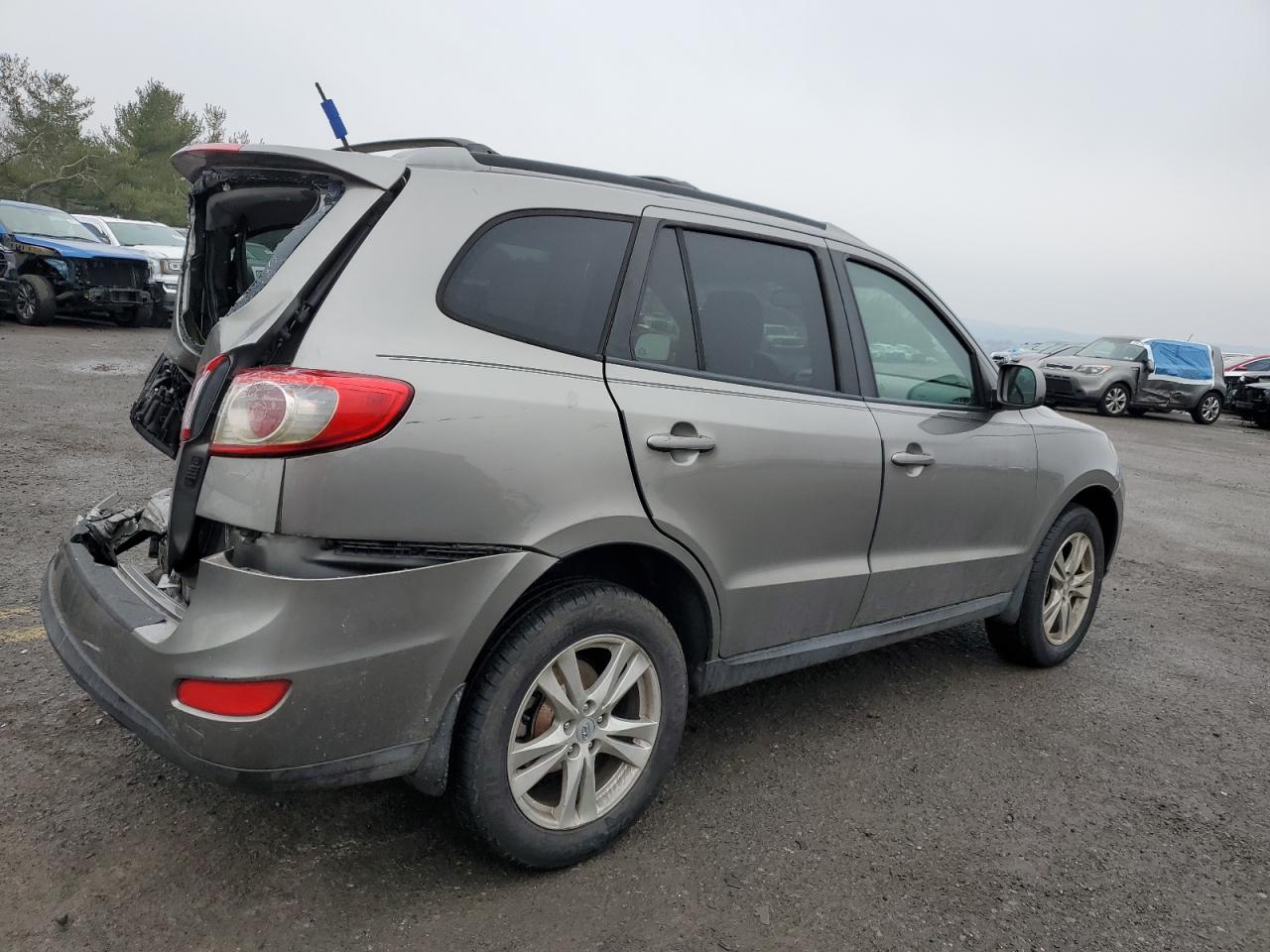 2012 Hyundai Santa Fe VIN 5XYZH4AG8CG114121 Copart auction photo, rear end / undercarriage damage thumbnail 3