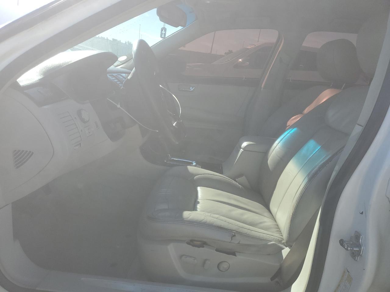 2010 Cadillac DTS VIN 1G6KA5EY0AU106995 Copart auction photo, all over / front end damage thumbnail 7