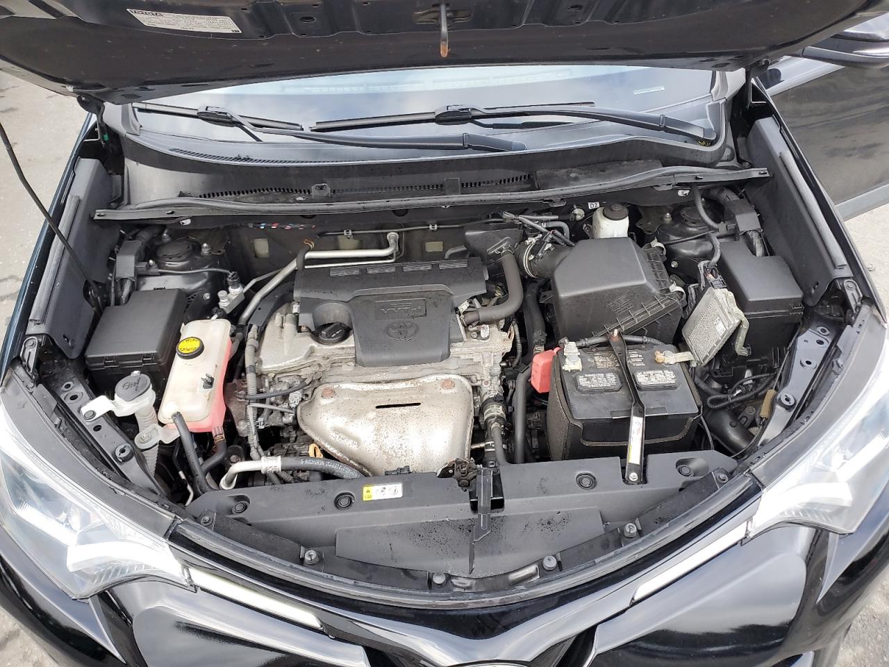 2018 Toyota RAV 4 VIN 2T3RFREV7JW852647 Copart auction photo, rear end / side damage thumbnail 12