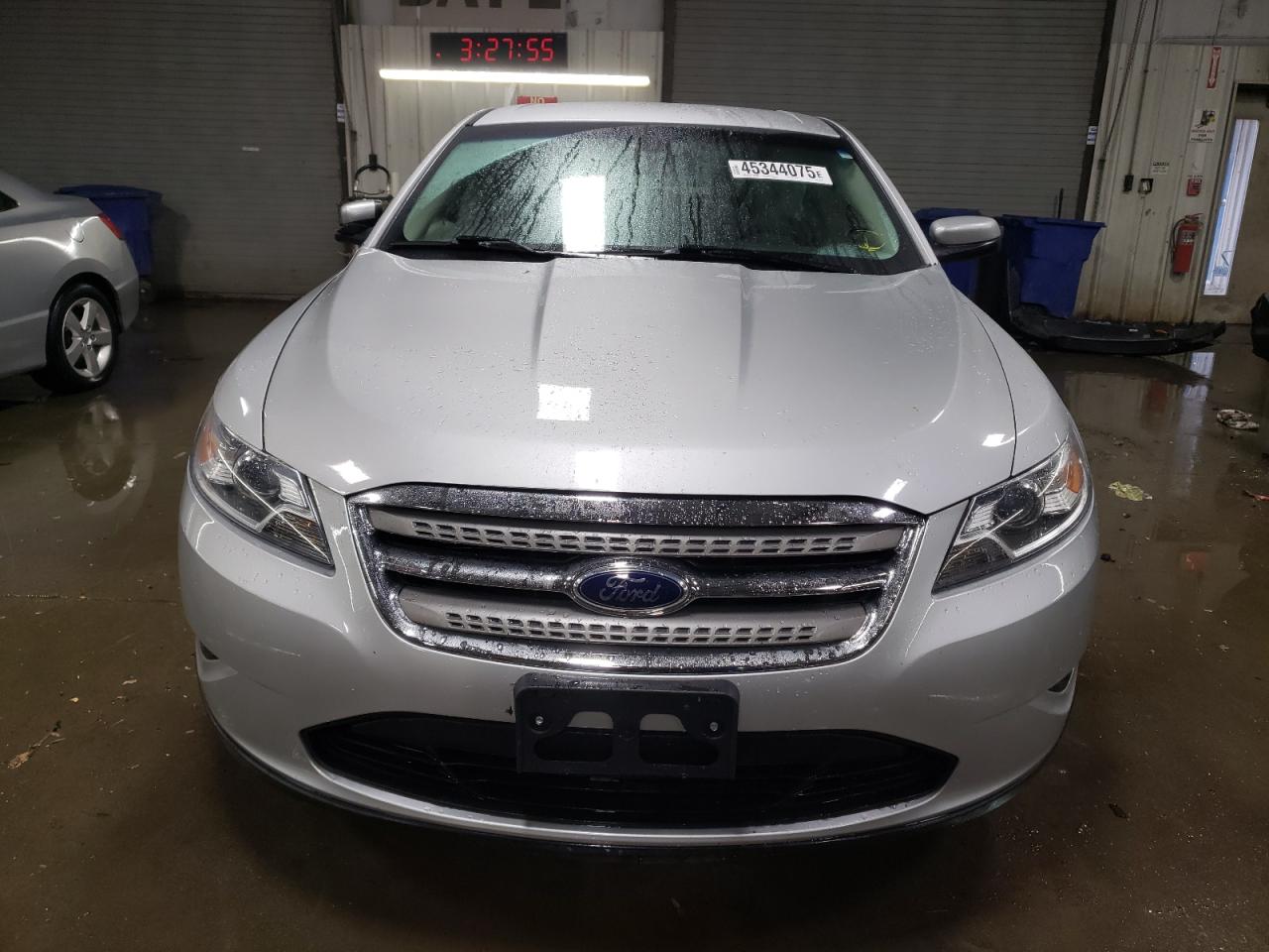 2011 Ford Taurus VIN 1FAHP2EW6BG186568 Copart auction photo, side damage thumbnail 5