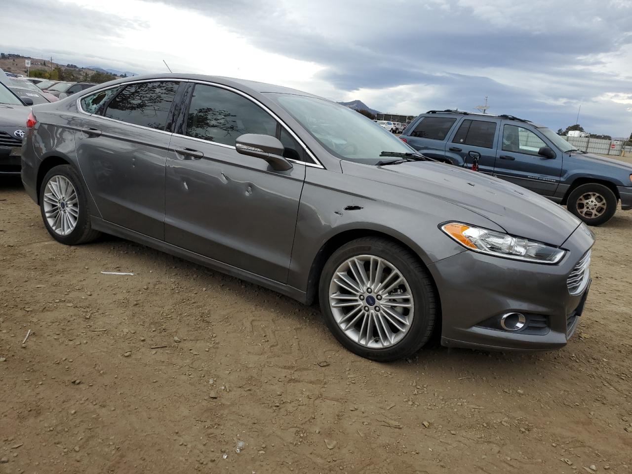 2014 Ford Fusion VIN 3FA6P0LU1ER203626 Copart auction photo, vandalism damage thumbnail 4