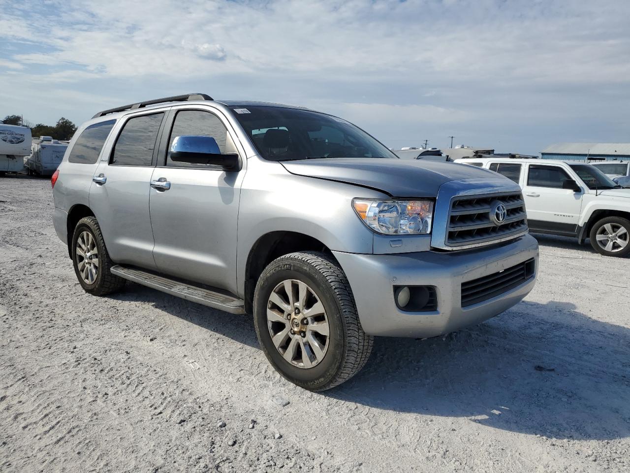 2010 Toyota Sequoia VIN 5TDDW5G14AS024859 Copart auction photo, side damage thumbnail 4