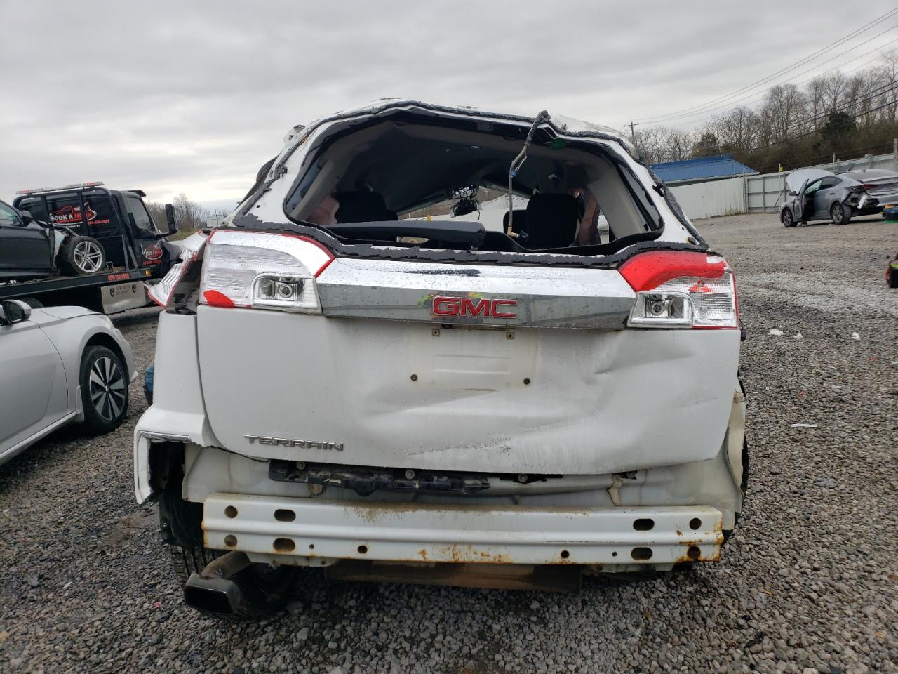 2017 GMC Terrain VIN 2GKALNEK8H6279398 Copart auction photo, rollover damage thumbnail 6