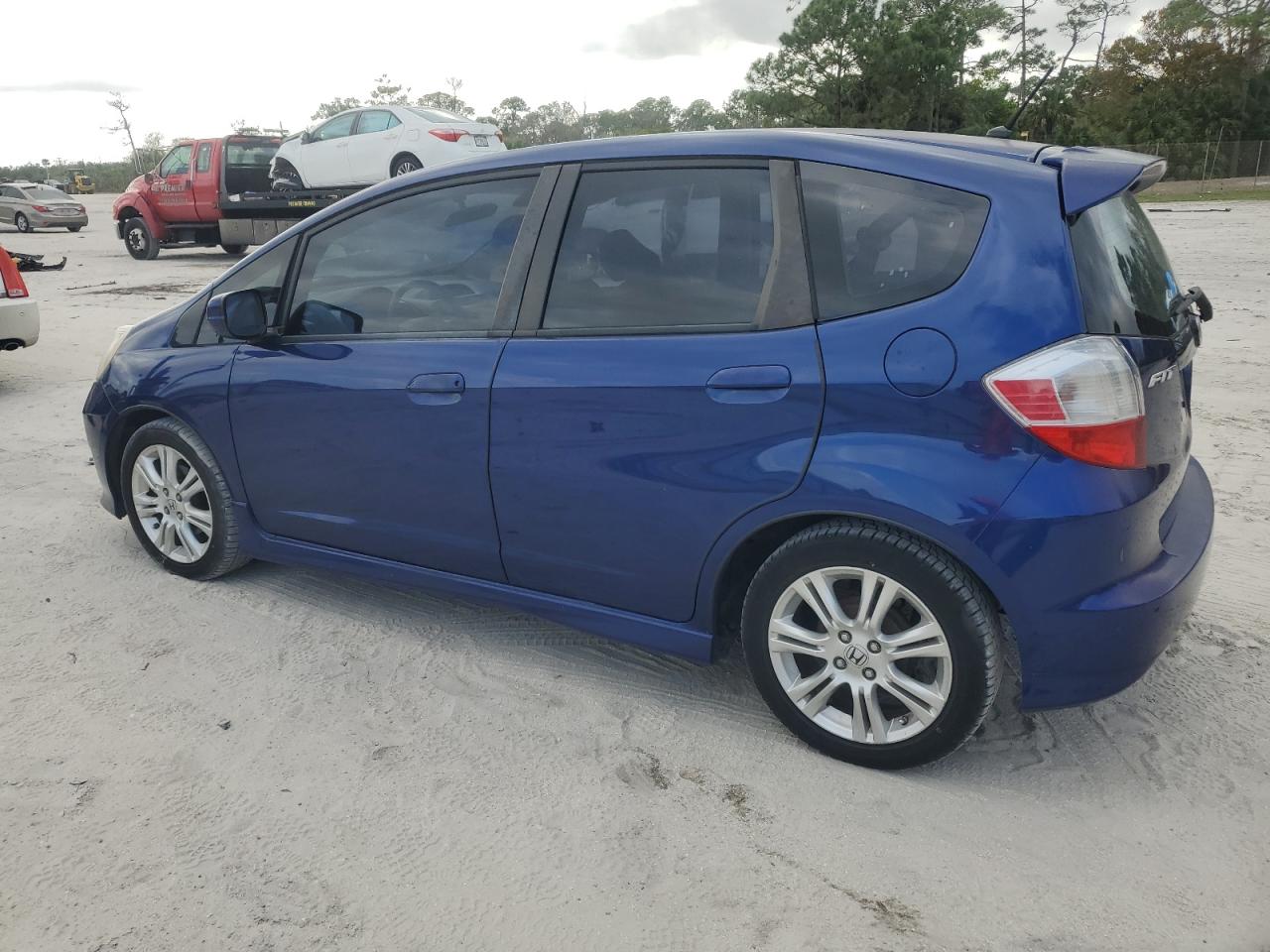 2011 Honda Fit VIN JHMGE8H51BC007229 Copart auction photo, side damage thumbnail 2