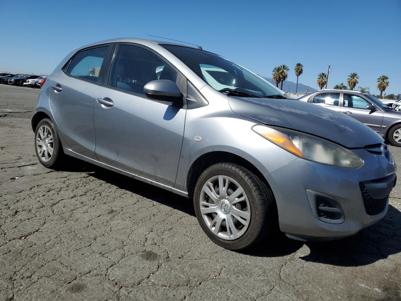 2011 Mazda 2 VIN JM1DE1HZXB0124940 Copart auction photo, minor dent/scratches damage thumbnail 4
