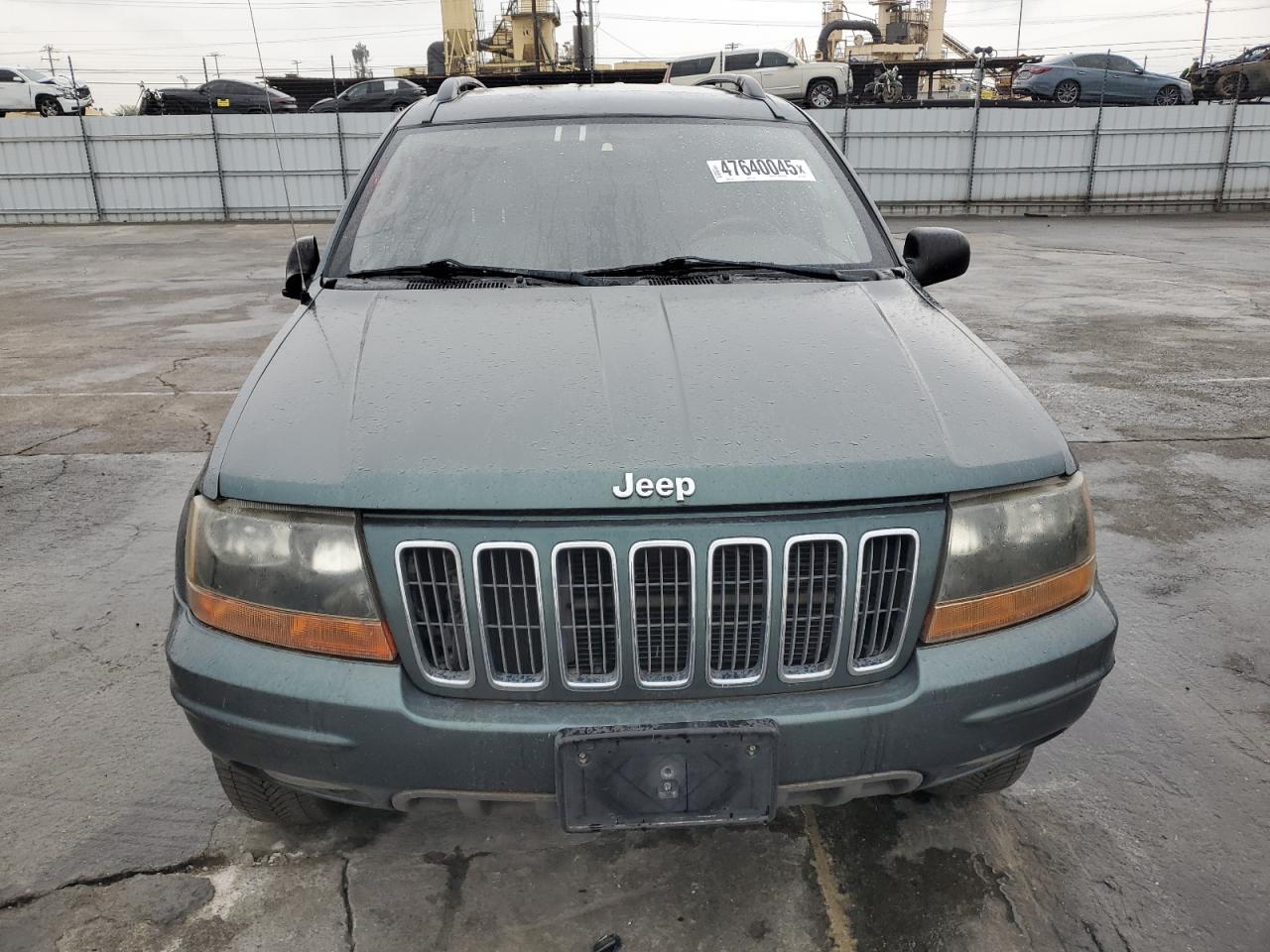 2002 Jeep Grand Cherokee VIN 1J8GW68JX2C279609 Copart auction photo, side damage thumbnail 5