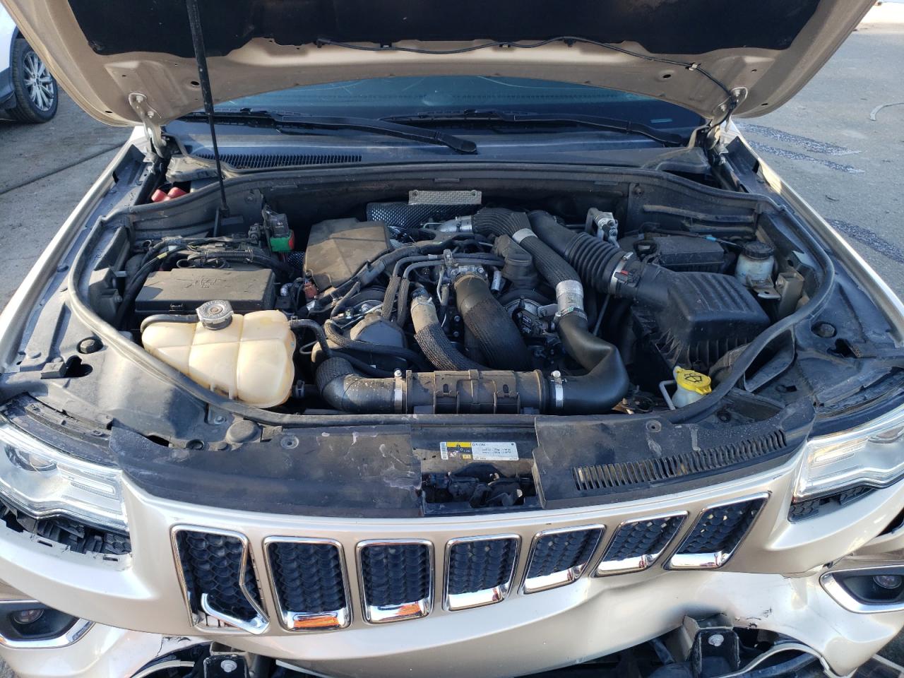 2014 Jeep Grand Cherokee VIN 1C4RJFCM2EC556953 Copart auction photo, front end damage thumbnail 11