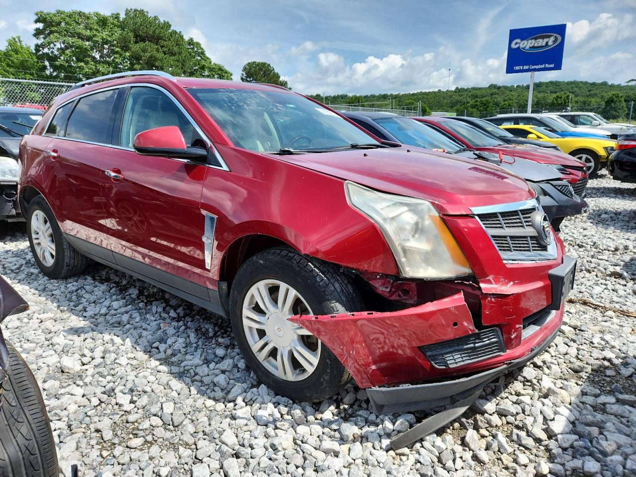2012 Cadillac SRX VIN 3GYFNDE33CS528466 Copart auction photo, front end / side damage thumbnail 4
