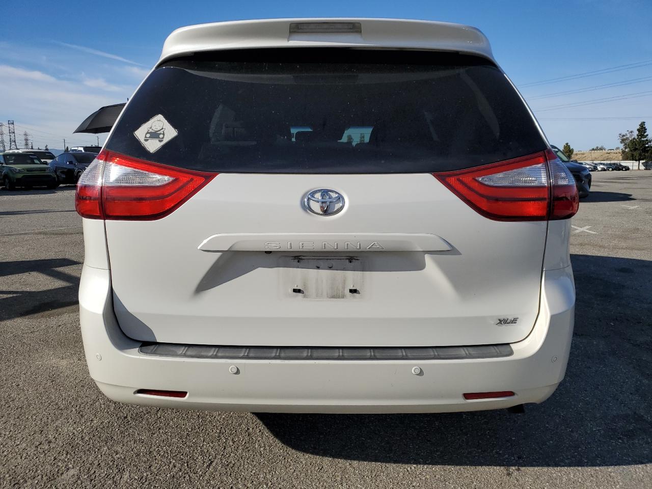 2015 Toyota Sienna VIN 5TDYK3DC8FS549714 Copart auction photo, side / undercarriage damage thumbnail 6