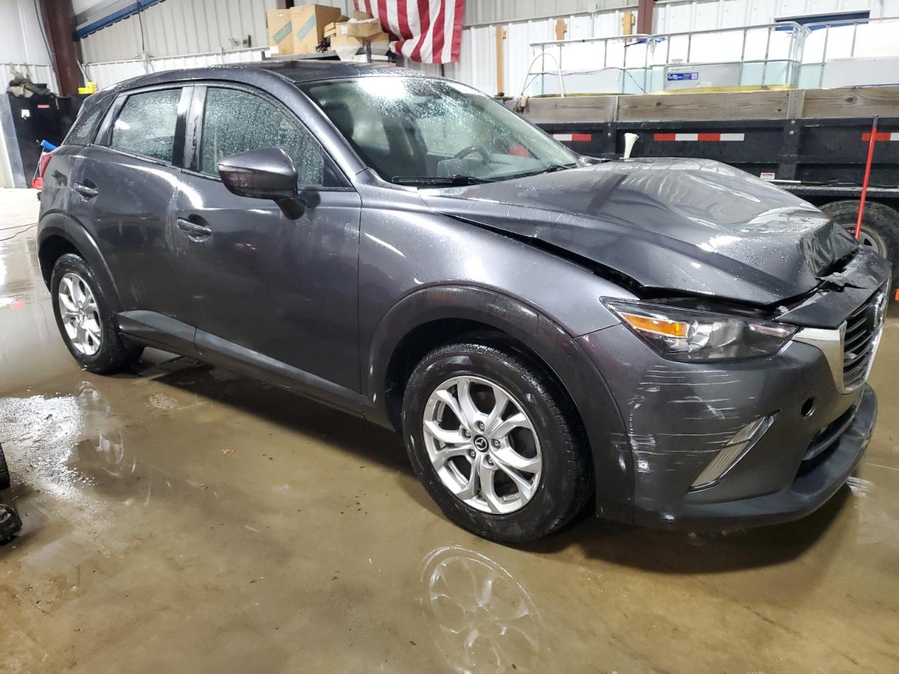 2016 Mazda CX-3 VIN JM1DKBC78G0118890 Copart auction photo, front end / side damage thumbnail 4