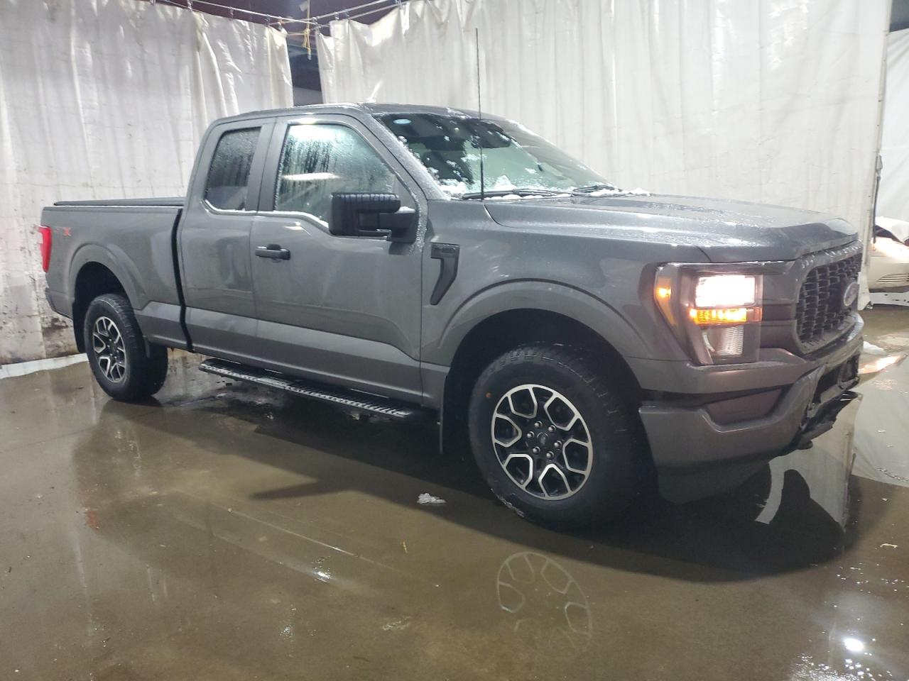 2023 Ford F-150 VIN 1FTFX1E56PKF63259 Copart auction photo, all over damage thumbnail 4