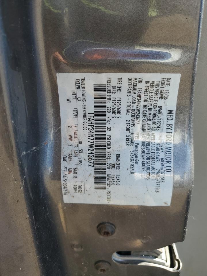 2007 Ford Focus VIN 1FAHP34N77W243677 Copart auction photo, normal wear damage thumbnail 12