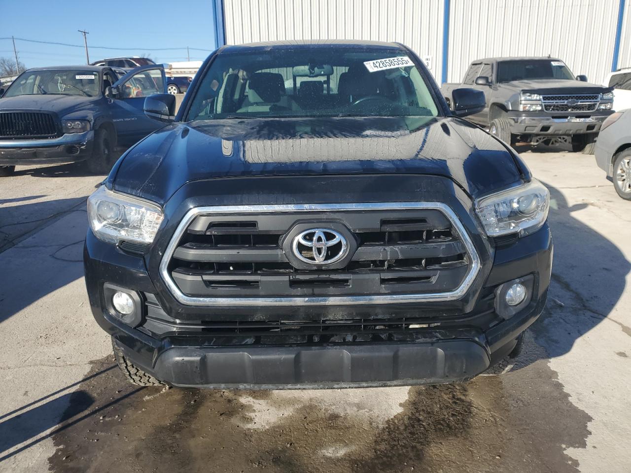 2016 Toyota Tacoma VIN 5TFCZ5AN5GX006906 Copart auction photo, front end / side damage thumbnail 5