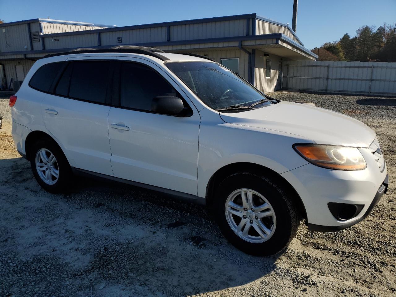 2010 Hyundai Santa Fe VIN 5NMSGDABXAH405568 Copart auction photo, all over damage thumbnail 4